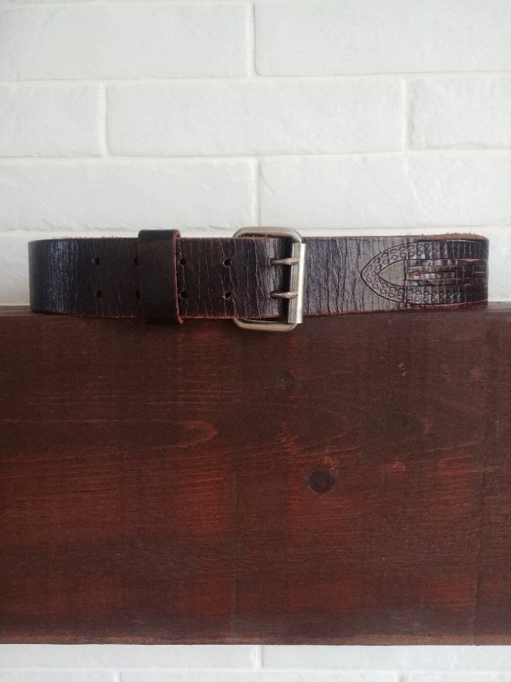 Men's wide weathered brown leather belt with silver buckle and cutout detail